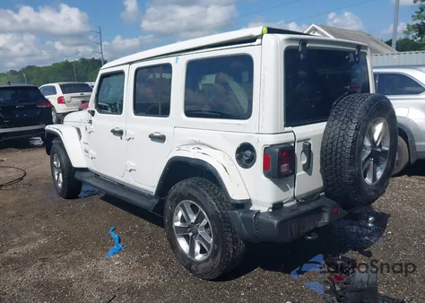 2022 Jeep Wrangler Unlimited Sahara from USA, damaged, VIN 1C4HJXEG9NW252543